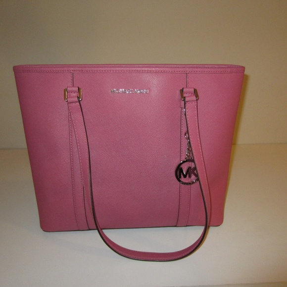 Michael Kors Handbags - ❗️SALE ❗️ Pink Michael Kors Purse- NEVER USED